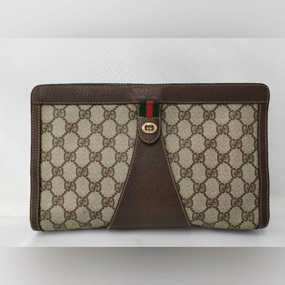 586 Gucci supreme clutch
